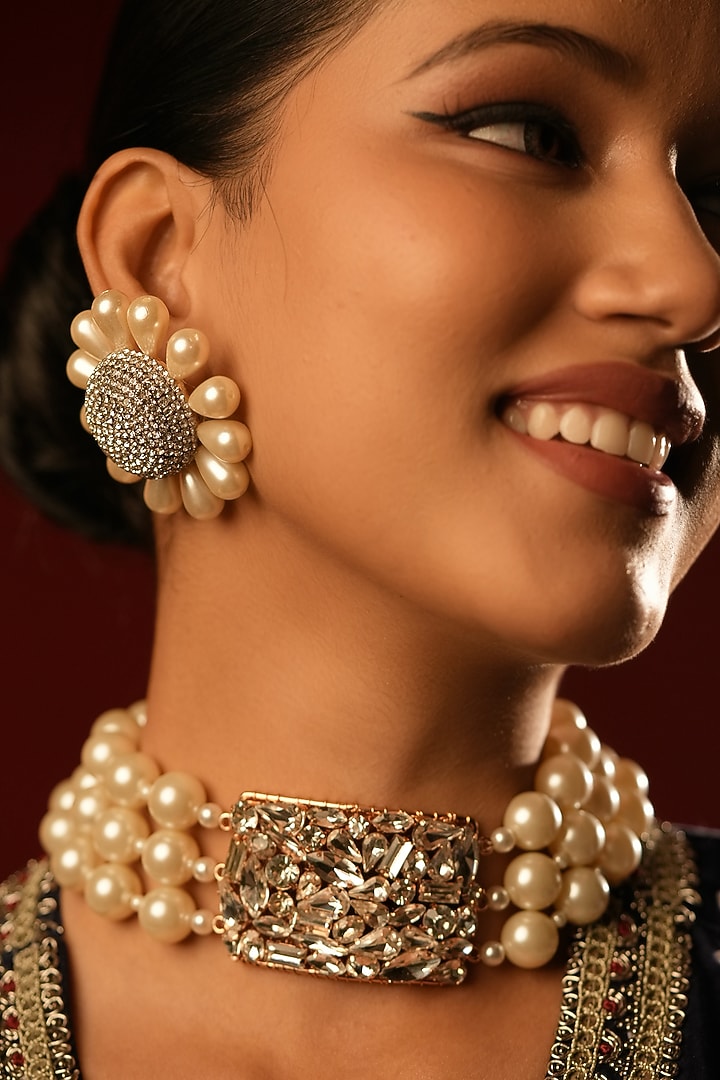 Gold Finish Crystal & Pearl Stud Earrings by Bijoux By Priya Chandna at Pernia's Pop Up Shop