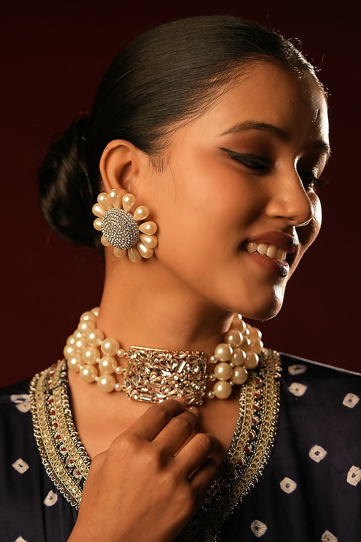 Gold Finish Crystal & Pearl Stud Earrings by Bijoux By Priya Chandna at Pernia's Pop Up Shop