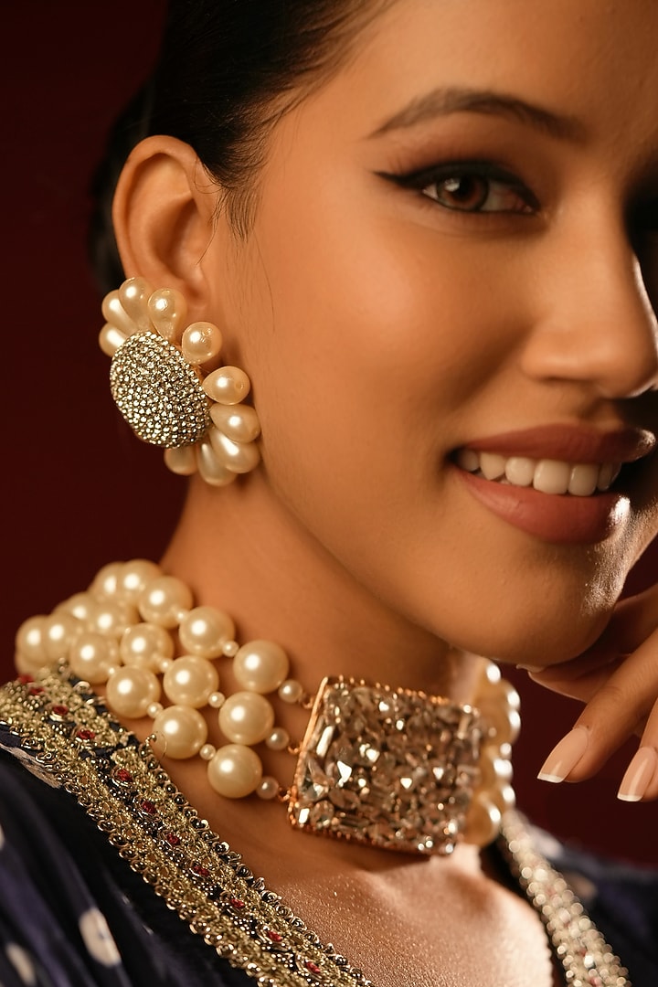 Gold Finish Crystal & Pearl Stud Earrings by Bijoux By Priya Chandna at Pernia's Pop Up Shop