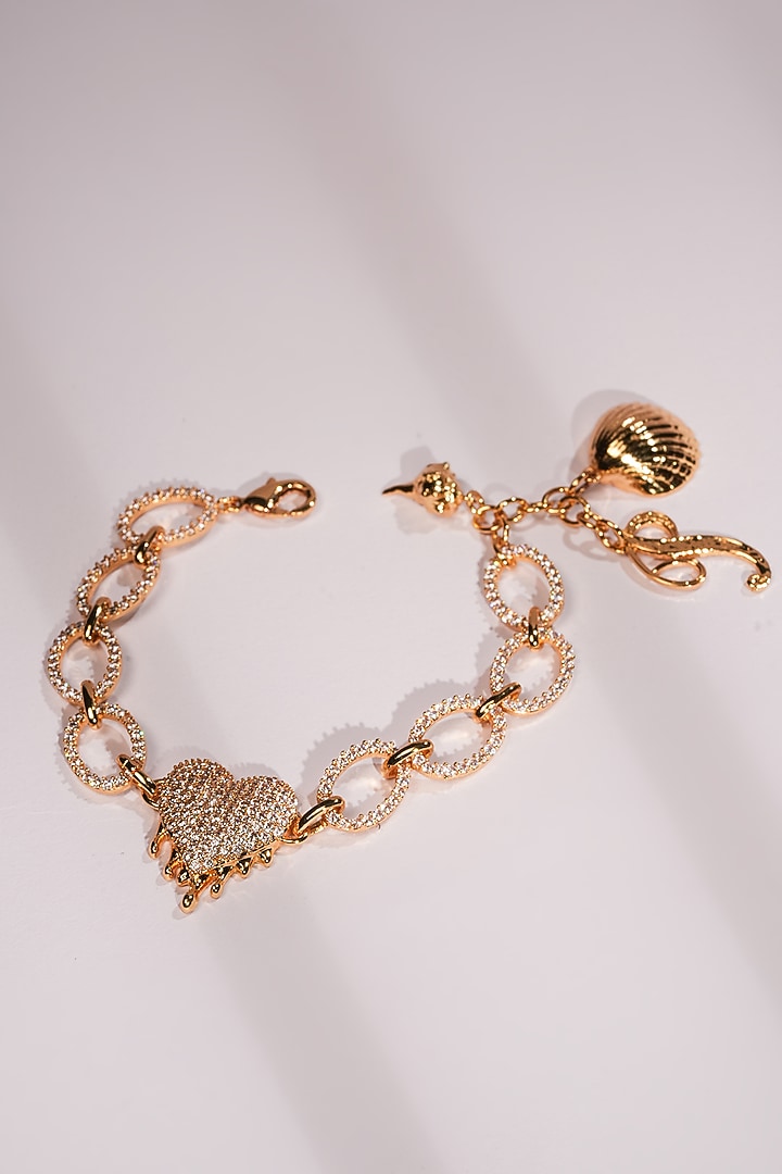 Gold Crystal & Heart Charm Bracelet by Bijoux By Priya Chandna at Pernia's Pop Up Shop