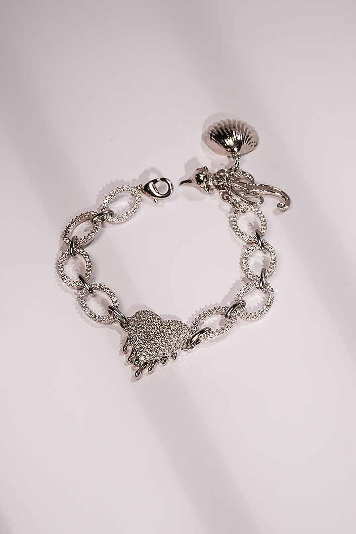 Silver Crystal & Heart Charm Bracelet by Bijoux By Priya Chandna at Pernia's Pop Up Shop