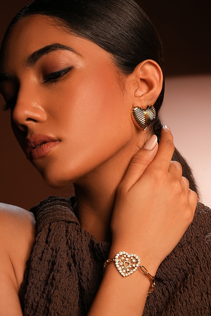 Gold Finish Crystal Heart-Shaped Link Chain Bracelet by Bijoux By Priya Chandna at Pernia's Pop Up Shop