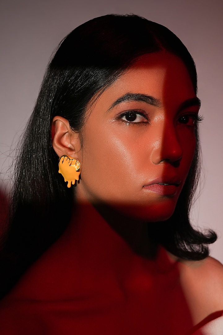 Yellow Resin Dripping Heart Stud Earrings by Bijoux By Priya Chandna at Pernia's Pop Up Shop