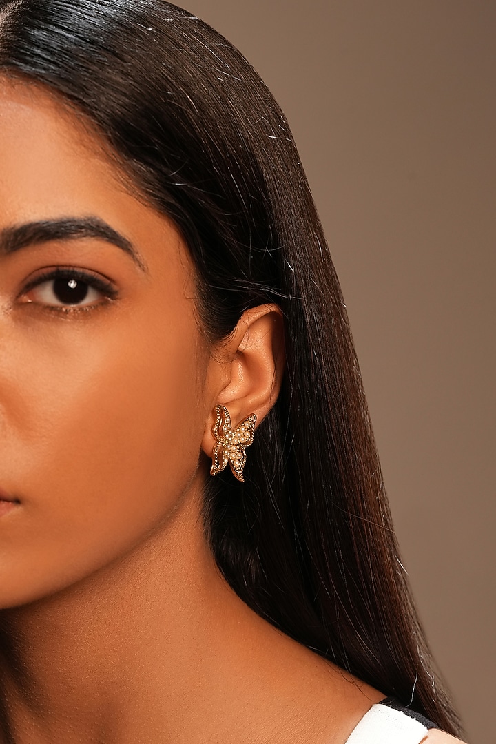 Gold Finish Crystal Butterfly Stud Earrings by Bijoux By Priya Chandna at Pernia's Pop Up Shop