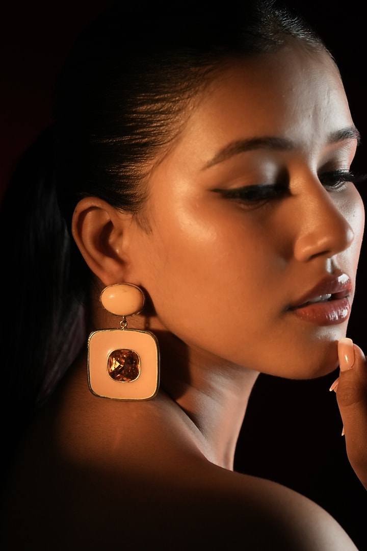 Gold Finish Amber Crystal Enameled Dangler Earrings by Bijoux By Priya Chandna at Pernia's Pop Up Shop