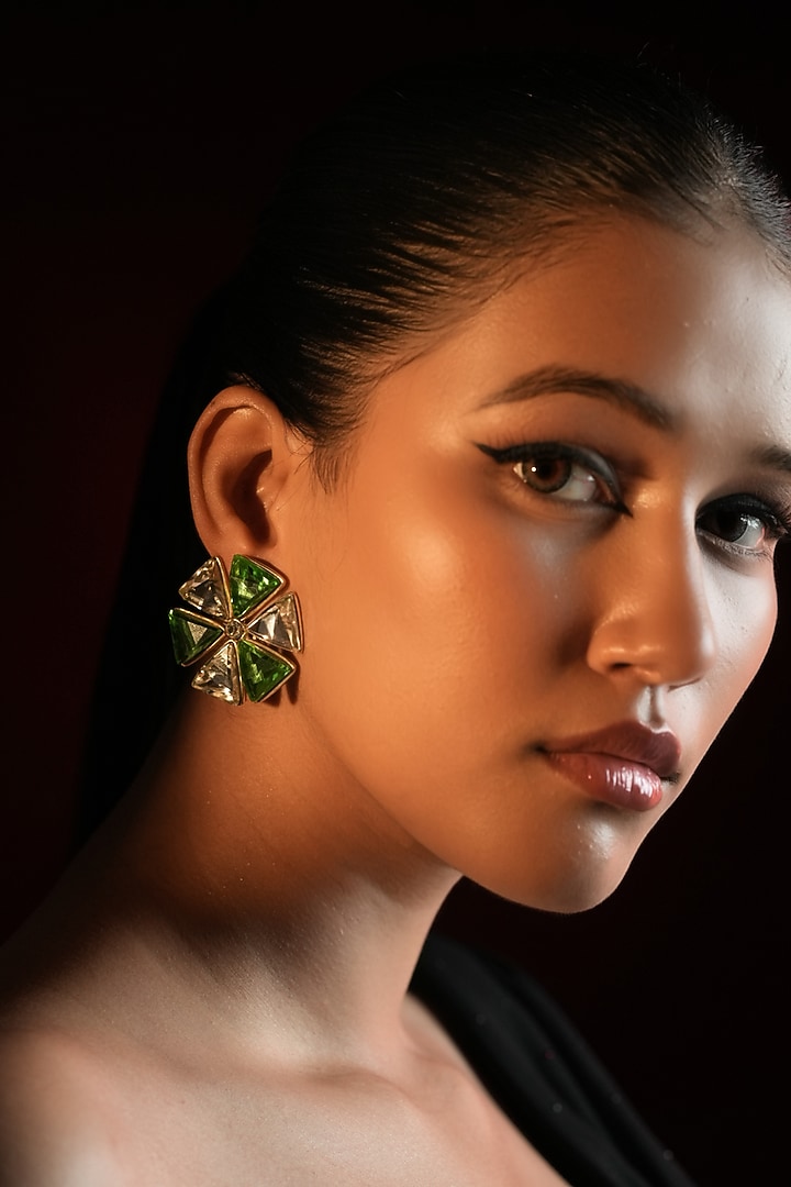 Gold Finish Triangle-Shaped Emerald Green Crystal Stud Earrings by Bijoux By Priya Chandna at Pernia's Pop Up Shop