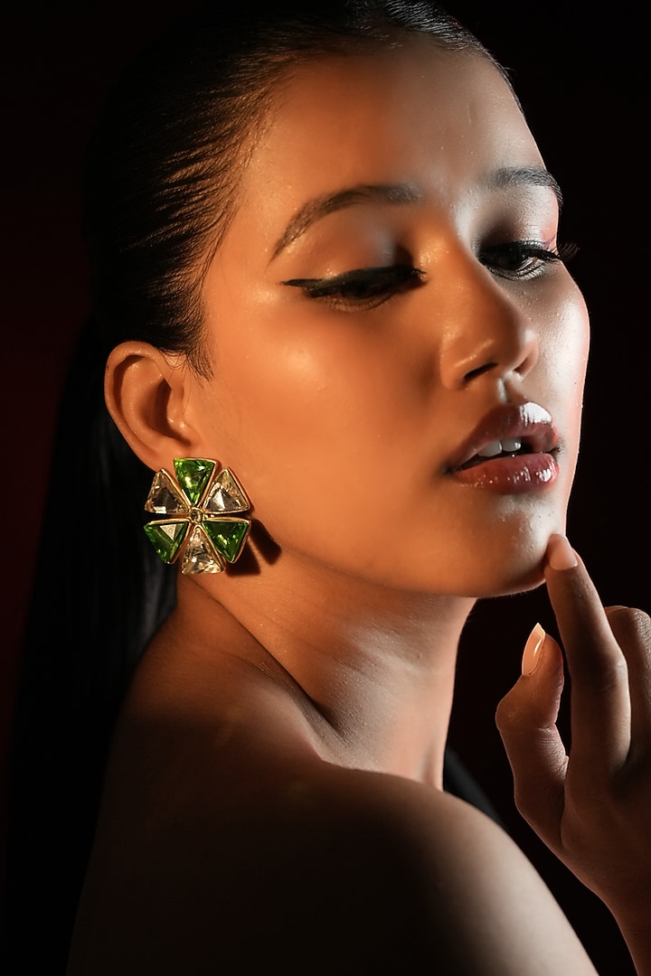 Gold Finish Triangle-Shaped Emerald Green Crystal Stud Earrings by Bijoux By Priya Chandna at Pernia's Pop Up Shop