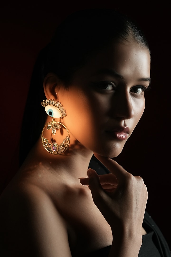 Gold Finish Crystal White Evil-Eye Hoop Earrings by Bijoux By Priya Chandna at Pernia's Pop Up Shop