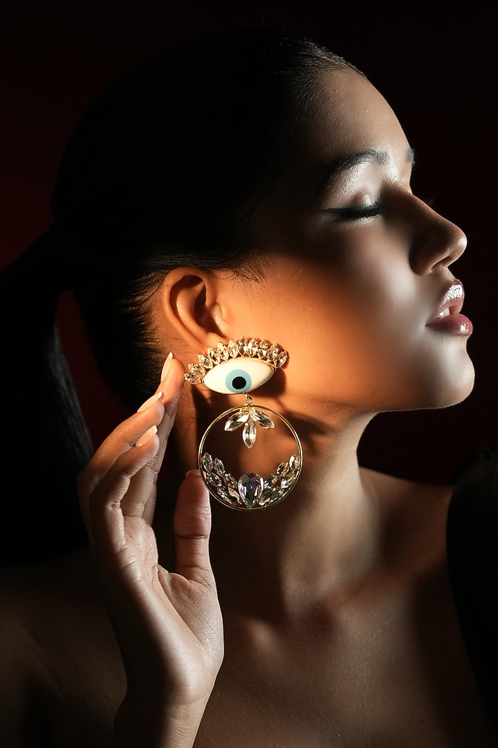 Gold Finish Crystal White Evil-Eye Hoop Earrings by Bijoux By Priya Chandna at Pernia's Pop Up Shop