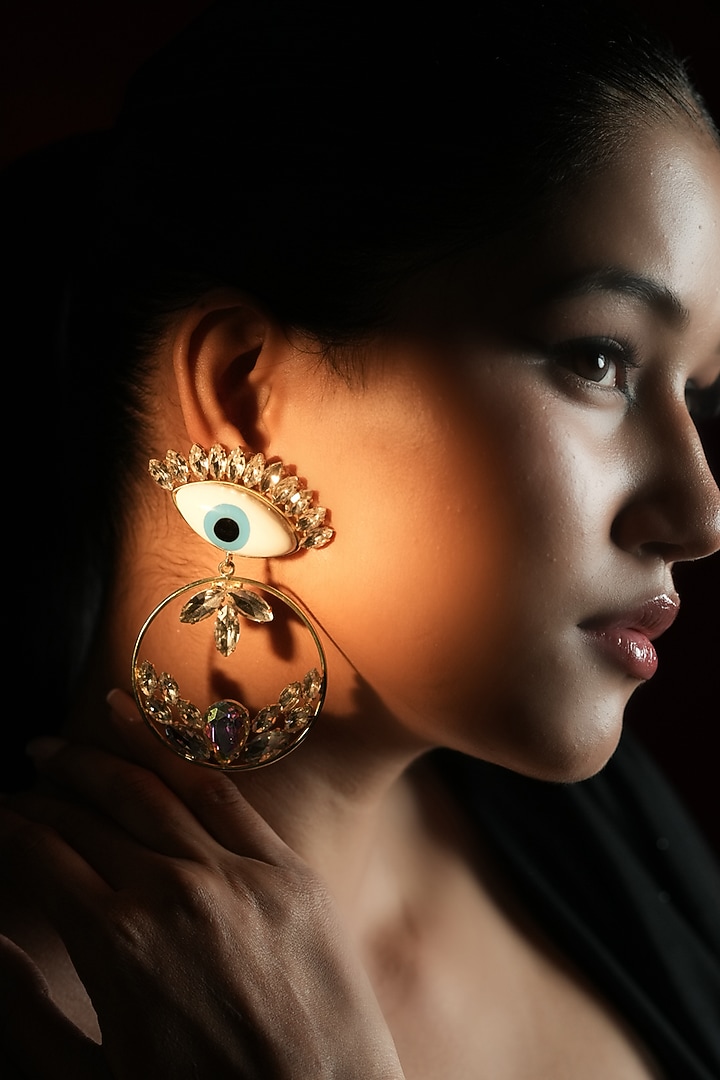 Gold Finish Crystal White Evil-Eye Hoop Earrings by Bijoux By Priya Chandna at Pernia's Pop Up Shop