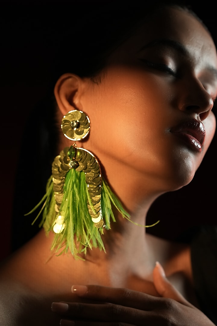 Gold Finish Sequins Work & Green Feather Tassel Dangler Earrings by Bijoux By Priya Chandna at Pernia's Pop Up Shop