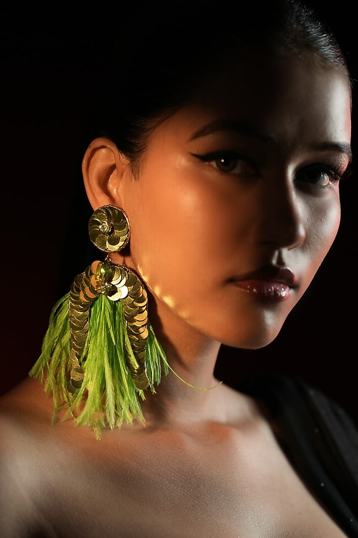 Gold Finish Sequins Work & Green Feather Tassel Dangler Earrings by Bijoux By Priya Chandna at Pernia's Pop Up Shop