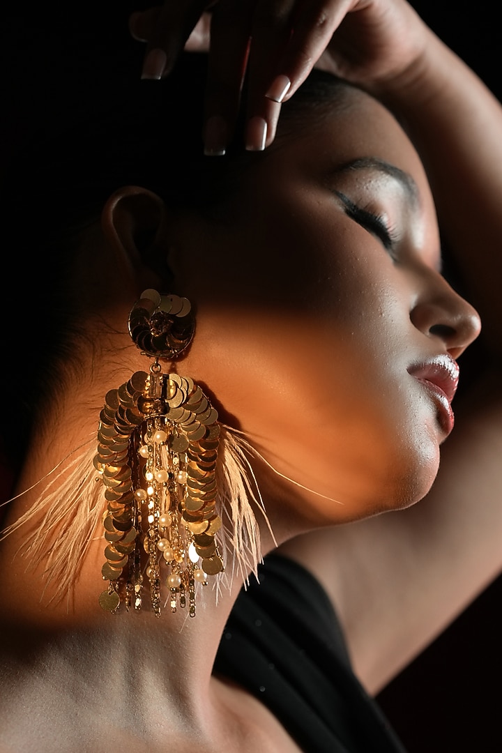 Gold Finish Sequins Work & Feather Tassel Dangler Earrings by Bijoux By Priya Chandna at Pernia's Pop Up Shop