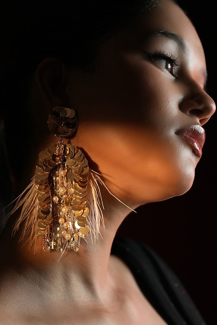 Gold Finish Sequins Work & Feather Tassel Dangler Earrings by Bijoux By Priya Chandna at Pernia's Pop Up Shop