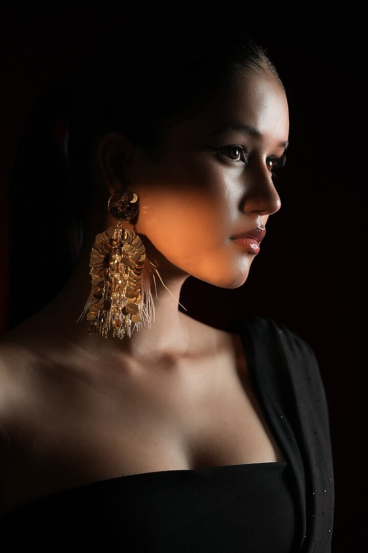 Gold Finish Sequins Work & Feather Tassel Dangler Earrings by Bijoux By Priya Chandna at Pernia's Pop Up Shop