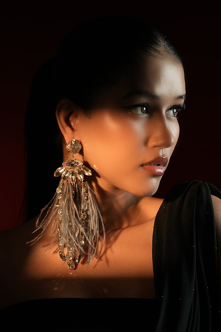 Gold Finish Crystal & Grey Feather Dangler Earrings by Bijoux By Priya Chandna at Pernia's Pop Up Shop