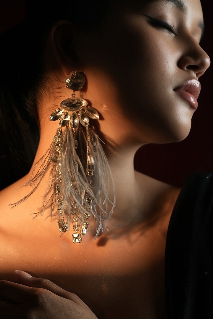 Gold Finish Crystal & Grey Feather Dangler Earrings by Bijoux By Priya Chandna at Pernia's Pop Up Shop