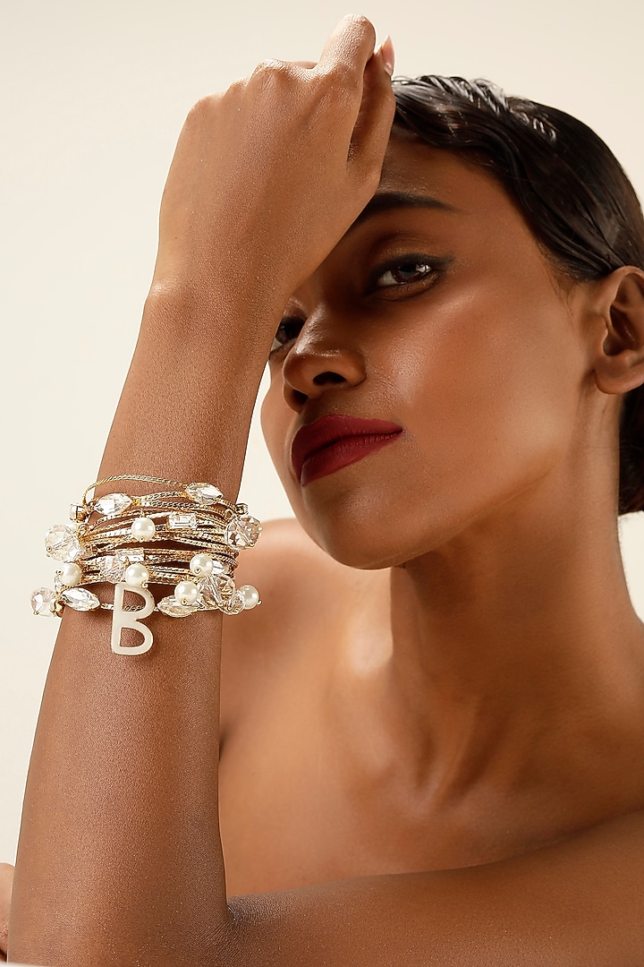 Gold Finish Pearl & Crystal Layered Bracelet by Bijoux By Priya Chandna at Pernia's Pop Up Shop
