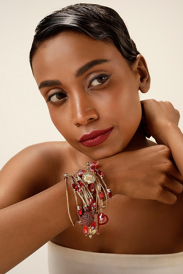 Gold Finish Red Crystal Layered Bracelet by Bijoux By Priya Chandna at Pernia's Pop Up Shop