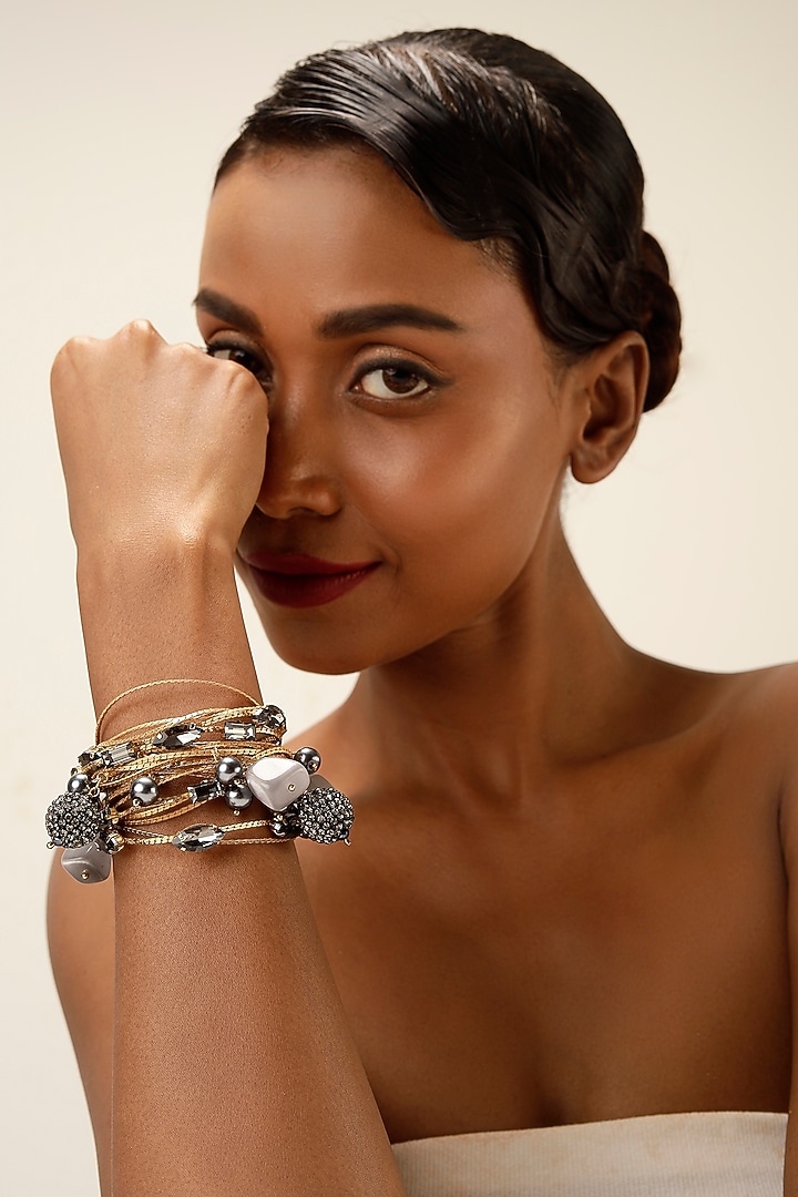 Gold Finish Smoky Crystal Layered Bracelet by Bijoux By Priya Chandna at Pernia's Pop Up Shop