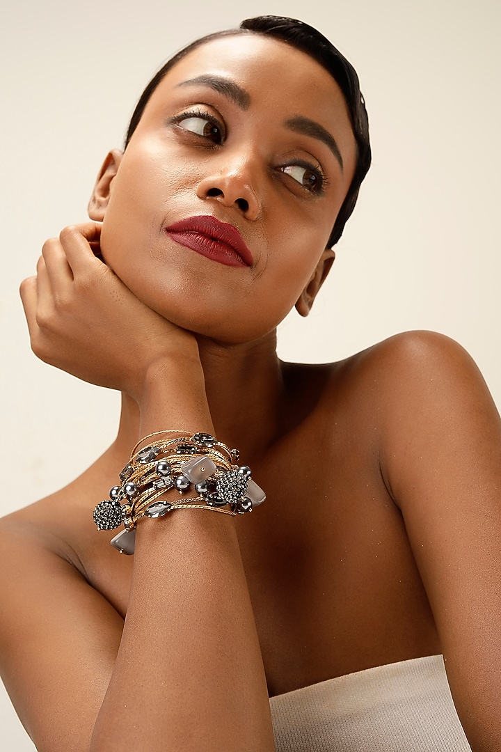 Gold Finish Smoky Crystal Layered Bracelet by Bijoux By Priya Chandna at Pernia's Pop Up Shop