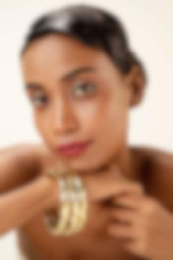 Gold Finish Brass Bangles (Set Of 3) by Bijoux By Priya Chandna at Pernia's Pop Up Shop