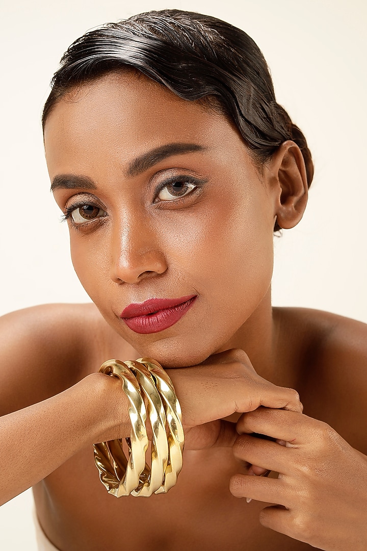 Gold Finish Brass Bangles (Set Of 3) by Bijoux By Priya Chandna at Pernia's Pop Up Shop