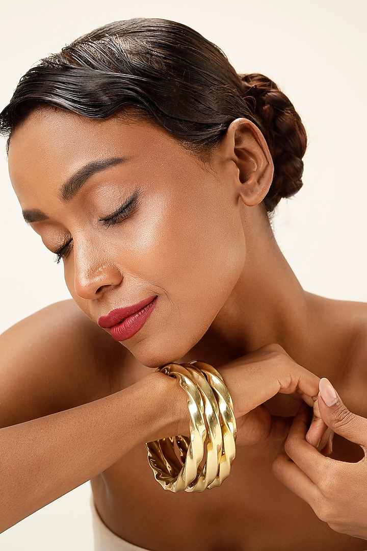 Gold Finish Brass Bangles (Set Of 3) by Bijoux By Priya Chandna at Pernia's Pop Up Shop