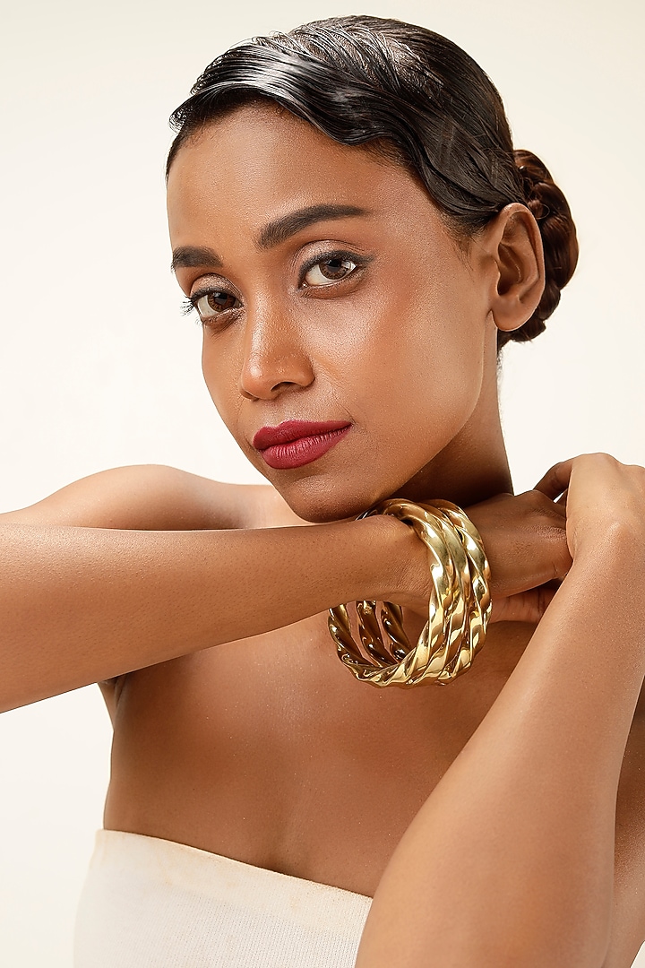 Gold Finish Brass Bangles (Set Of 3) by Bijoux By Priya Chandna at Pernia's Pop Up Shop