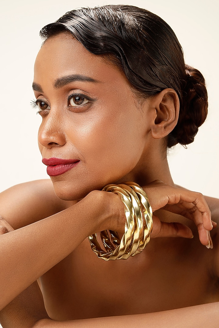 Gold Finish Brass Bangles (Set Of 3) by Bijoux By Priya Chandna at Pernia's Pop Up Shop
