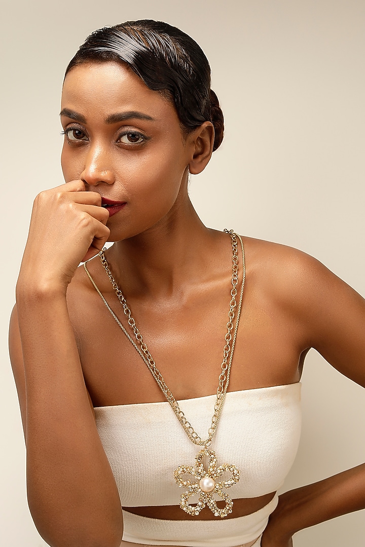Gold Finish Pearl & Crystal Floral Pendant Necklace by Bijoux By Priya Chandna at Pernia's Pop Up Shop