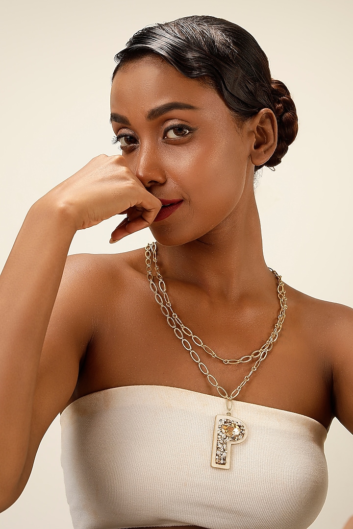 Gold Finish Pearl & Crystal Initial Pendant Necklace by Bijoux By Priya Chandna at Pernia's Pop Up Shop