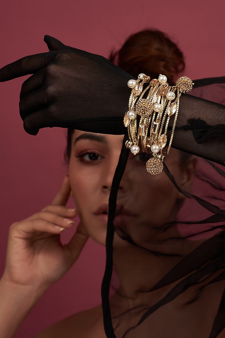Gold Finish Crystal & Pearl Magnetic Bracelet by Bijoux By Priya Chandna