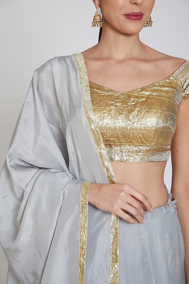 Dove Blue Embroidered Wedding Lehenga Set by Bhairavi Jaikishan at Pernia's Pop Up Shop