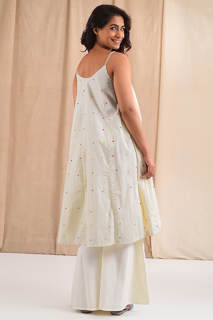 Cream Cotton Hand Embroidered Kurta Set by Blushing Couture by Shafali at Pernia's Pop Up Shop