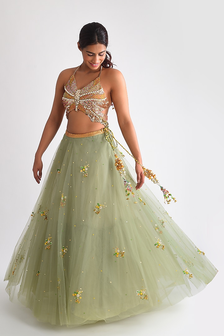 Pista Green Net Sequins & Ghungroo Hand Embroidered Lehenga Set by Blushing Couture by Shafali