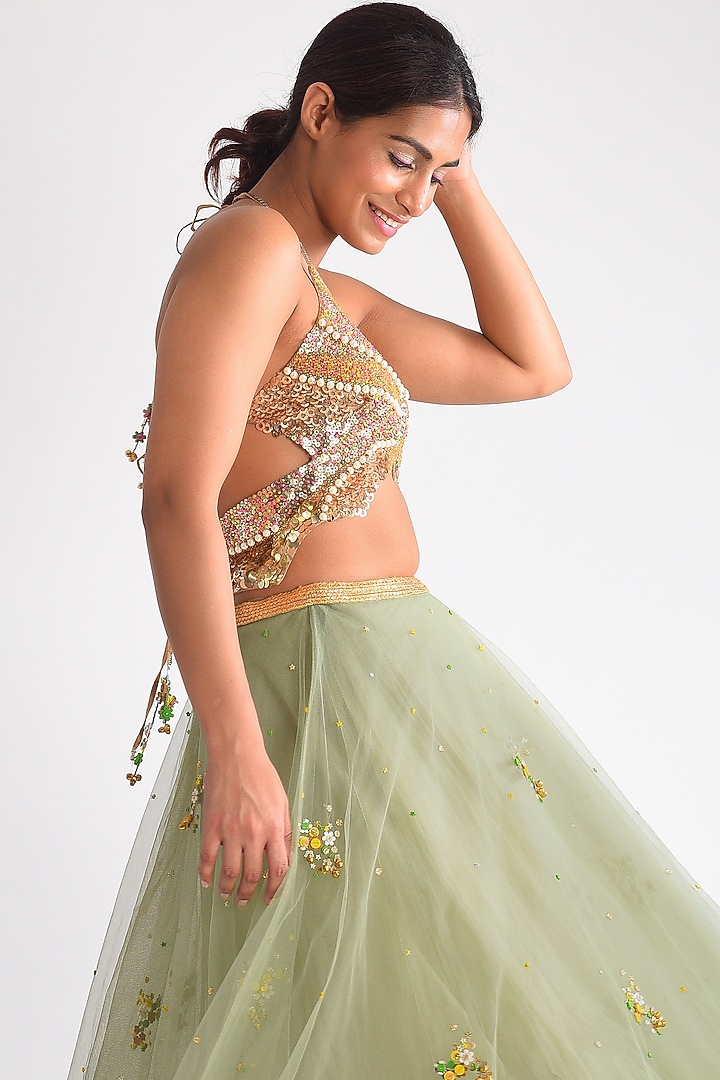 Pista Green Net Sequins & Ghungroo Hand Embroidered Lehenga Set by Blushing Couture by Shafali at Pernia's Pop Up Shop