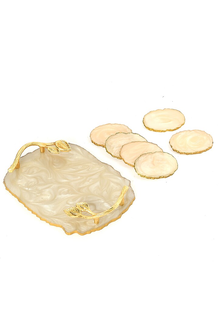 Cream Ivory Resin Tray & Coaster (Set Of 7) by BLUE ELEPHANT at Pernia's Pop Up Shop