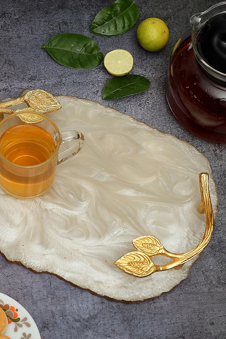 Cream Ivory Resin Tray & Coaster (Set Of 7) by BLUE ELEPHANT at Pernia's Pop Up Shop
