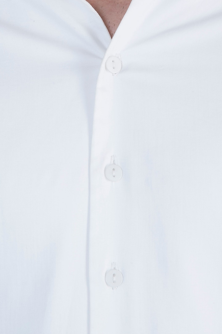 White bespoke handcrafted shirt available only at Pernia's Pop Up Shop.