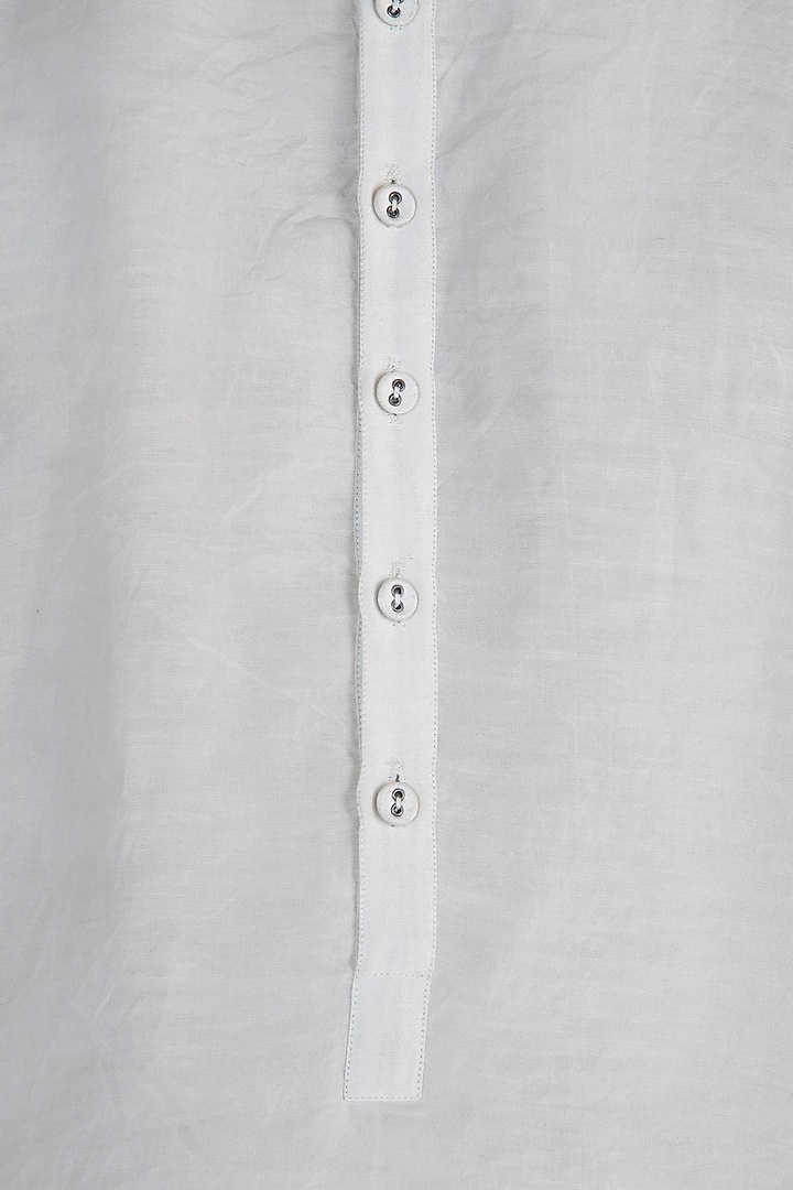 Ivory kurta with churidar available only at Pernia's Pop Up Shop.