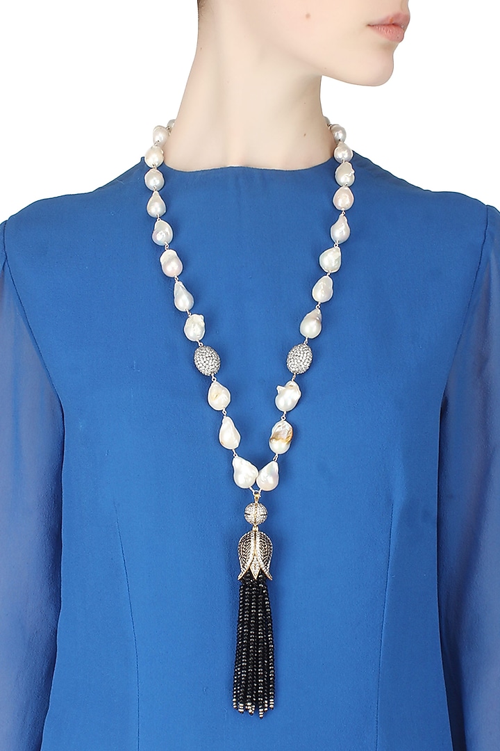 Baroque pearls and black semi-precious stones tulip string necklace available only at Pernia's Pop Up Shop.