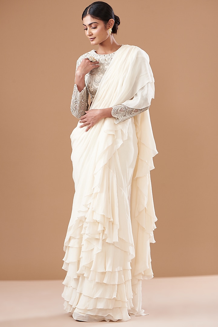 Ivory Georgette Ruffled Saree Set by Bhumika Sharma at Pernia's Pop Up Shop