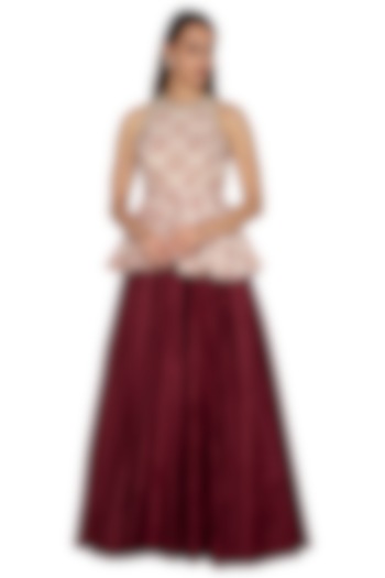 Ivory Embroidered Peplum Top With Maroon Skirt by Bhumika Sharma