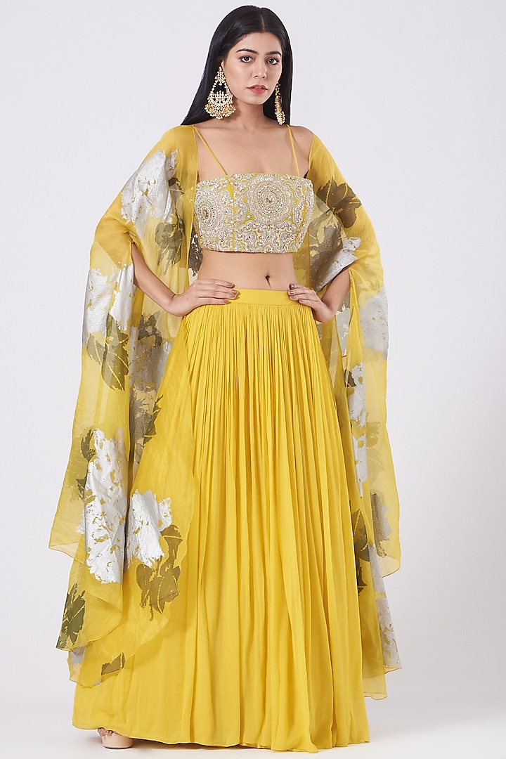 Yellow Skirt Set With Printed Cape by Bhumika Sharma