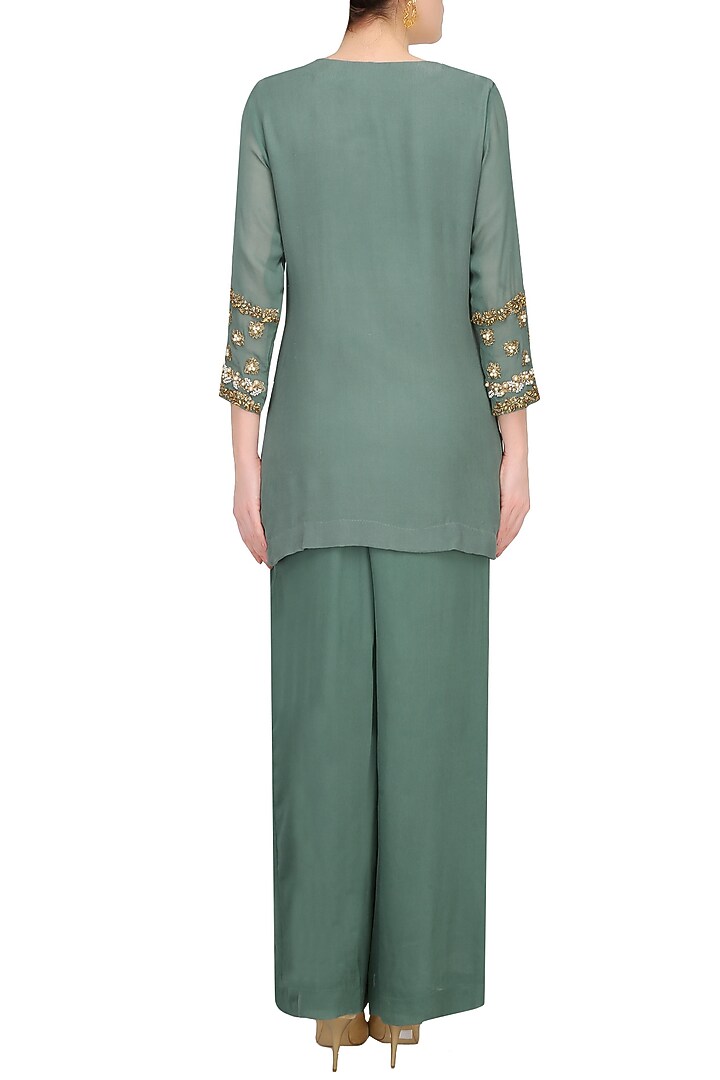 Autumn pearl and gota thread work jacket with matching sequinned gharara pants available only at Pernia's Pop Up Shop.