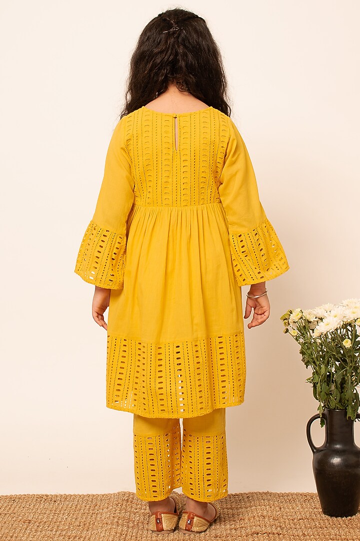 Yellow Cotton Cutwork Embroidered Kurta Set For Girls by Boteh at Pernia's Pop Up Shop