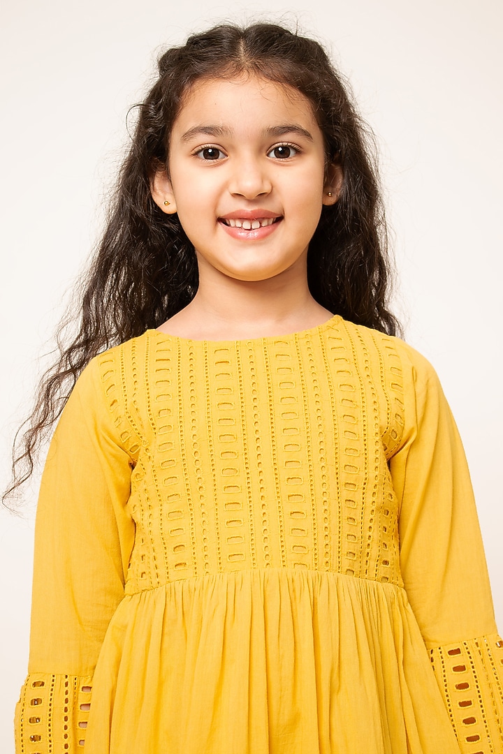 Yellow Cotton Cutwork Embroidered Kurta Set For Girls by Boteh at Pernia's Pop Up Shop