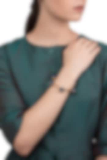 Gold plated Navy blue zircon audrey bangle available only at Pernia's Pop Up Shop.