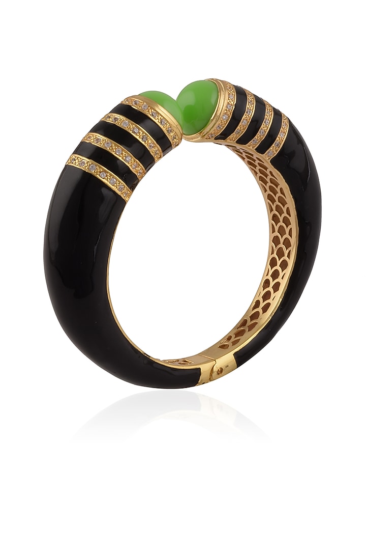 The Bohemian presents Black pyramid enamel bangle available only at Pernia's Pop Up Shop.